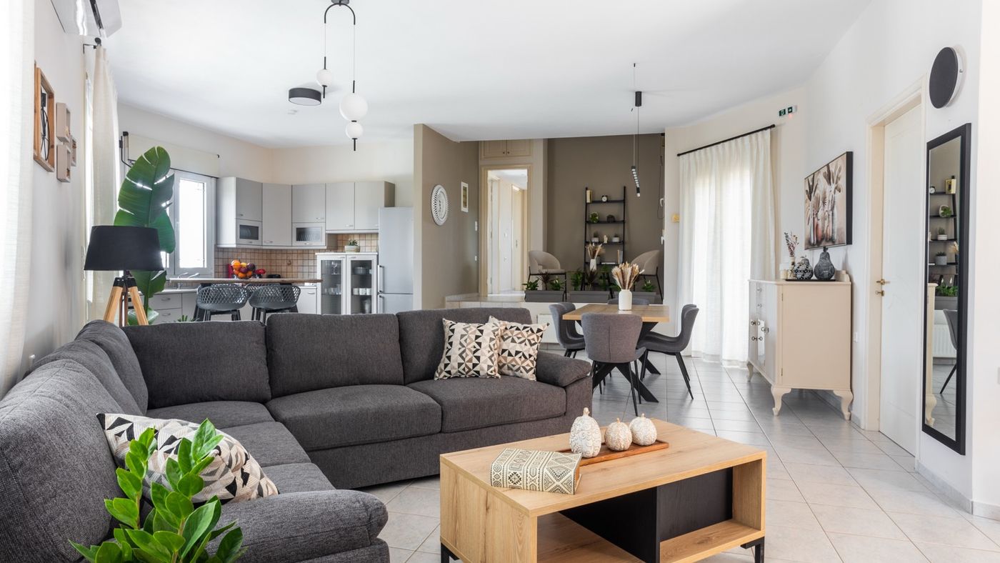 Open living and dining area at Olive Apartment Crete
