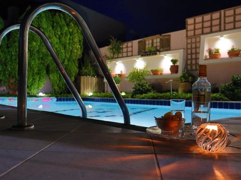 The pool lit up at night
