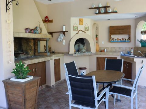 Outdoor kitchen with wood oven