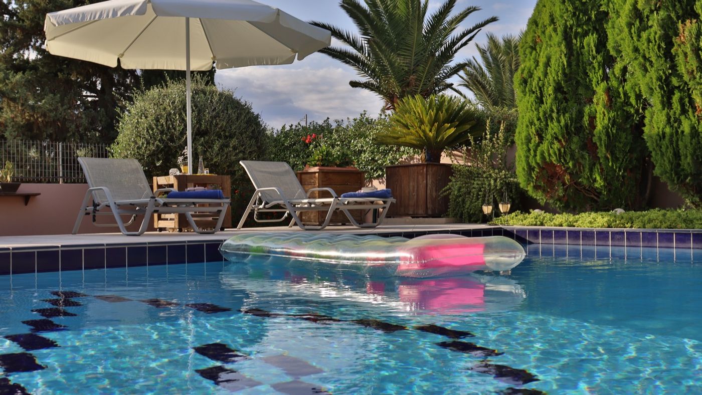 Private pool with sun loungers at Olive Villa Crete